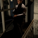 4. The dancer begins to disrobe.