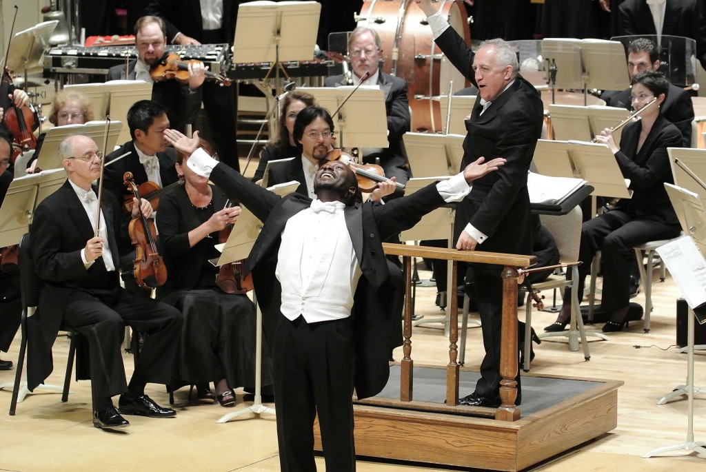 Jermaine Smith as Sportin' Life in Porgy and Bess with Bramwell Tovey conducting the BSO. Photo Stu Rosner.